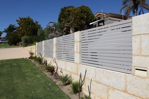 Simply Slat Fencing Pic 5 - Dune colour slat fence between Limestone piers