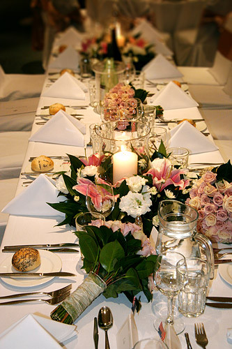 Flowers by Anita Pic 1 - Wedding reception table arrangements with bouquets