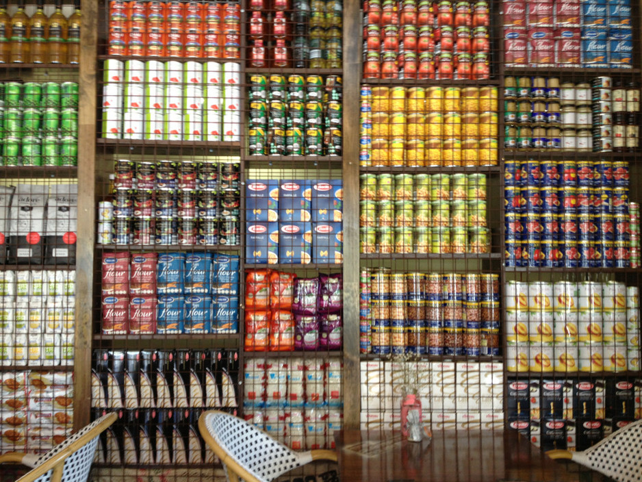 The Plantation House Cafe Pic 2 - The funky can wall at TPHC