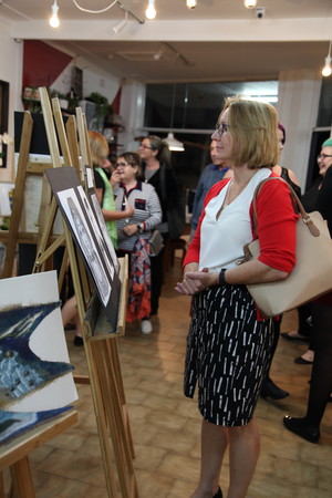 At The Corner Pic 3 - visitors judging art in our studio