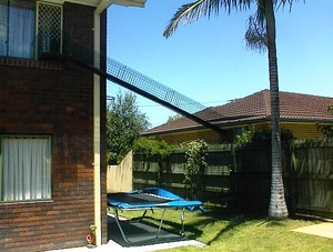 Aussie Cat Enclosures Pic 5 - Second story window box and tunnel leading to enclosure under palm tree