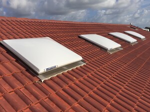 Regent Skylights Pic 2 - Regent Skylights with Custom Made Stainless Steel bases fitted onto a tiled roof at Seaworld QLD