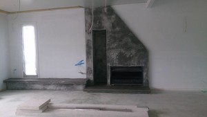 Noosa Decorating Pic 3 - Polished industrial concrete fireplace includes wood storage bay and seating