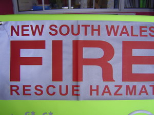 Mi Logo and Apparel Pic 3 - NSW Fire Reflective with red text