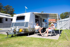 Burleigh Beach Tourist Park Pic 2 - Burleigh Beach relaxing on site