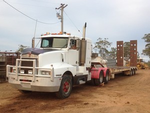 K&G Ahchay Dozer & Excavator Hire Pic 2 - prime mover with tri axle float