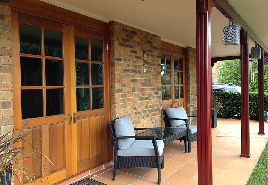 NRA Constructions Pic 1 - Existing metal windows removed and openings widened to make way for beautiful cedar doors out on to the verandah A great example of optimising your living space and enhancing the flow of your living areas