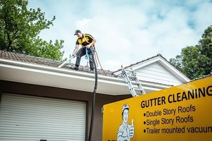 OzWide Gutter Cleaning Pic 4 - We use a safety harness and lifeline Our guys are trained to work safely at heights