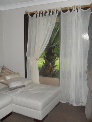 A Thousand & One Nets Pic 5 - Net Curtains available in Natural White Turquoise and Red