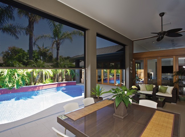 Your World Outdoor Blinds and Shutters Pic 1 - Outdoor Blinds are perfect for keeping out the sun in summer and keeping the warmth in winter