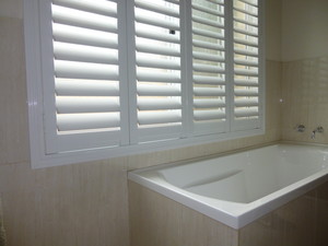 Your World Outdoor Blinds and Shutters Pic 5 - PVC shutters are perfect for wet area