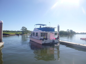 Coomera Houseboat Holidays Pic 2 - Seaview backing into her berth after a weekend away