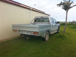 Simon Built Pic 4 - Custom replacement tray with built in toolboxes and drop down sides for a F250