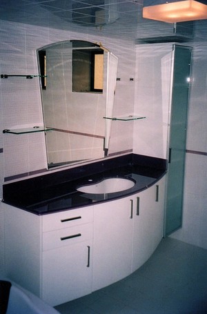 Emerald Custom Joinery Pic 4 - Modern style curved front vanity with thick glass top