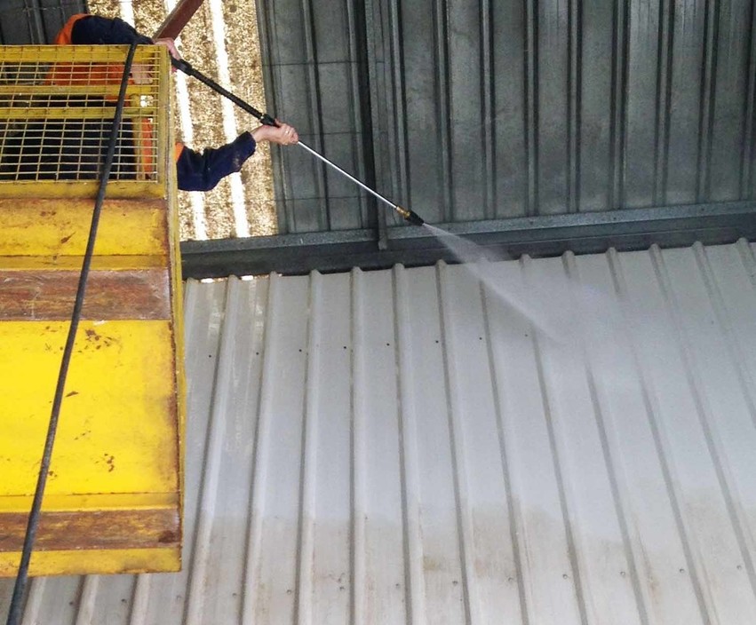 PRIMAS Industrial Cleaning Pic 2 - High pressure cleaning walls inside an industrial unit