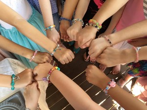 String of Beads Parties Pic 4 - Stretch bracelets with a charm made at a party