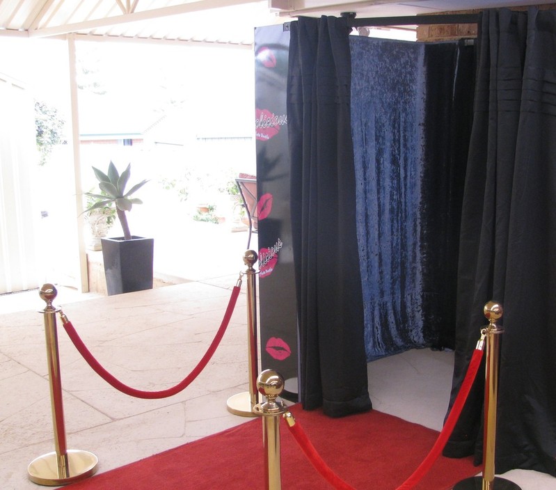 Photolicious Photo Booths Pic 1 - Booth with Red Carpet Bollards