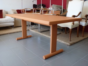 Spring Upholstery Pic 2 - Dining table covered in tan leather