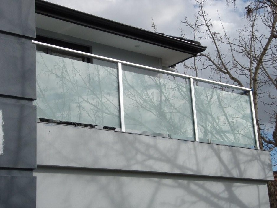 Alexandria Wrought Iron P/L Pic 1 - Semi Framed Polished Anodised with 638mm Translucent glass Balustrade