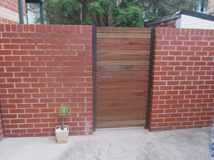 FENCES n GATES Pic 3 - Timber cladding on steel pedestrian gate