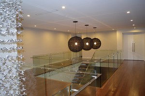 glass Fence WAREHOUSE Pic 2 - Frameless indoor balustrade with stand off brackets