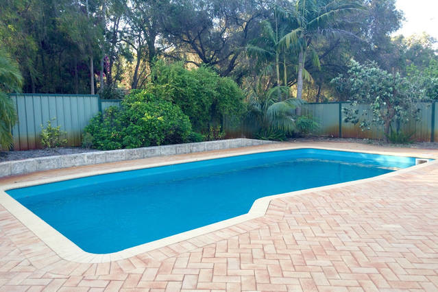 Stratham Retreat Pic 1 - Leisure pool for guest use with heated outdoor shower for your convenience