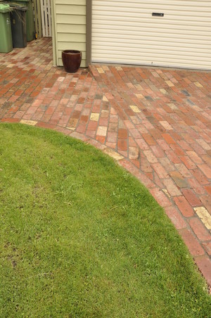 Done and Dusted Maintenance Services Pic 3 - Solid brick paving of a double driveway and courtyard