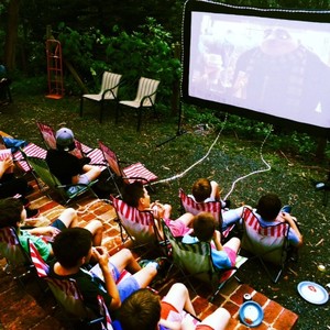 Melbourne's Mobile Backyard Movie nights Pic 5 - Backyard Movie nights Rental unit doubles as a Games unit and Karaoke Slideshows weddings and much more