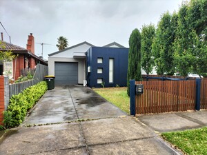 Marks Painting Melb Pic 4 - Repainting of house facade Placed cement sheeting Gable above garage fixed render patching where required stripped and restained front fence