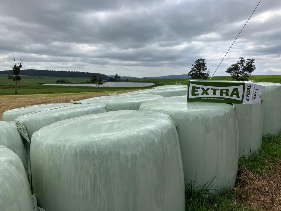 Silage Wrap Pic 1 - A rural landscape featuring tightly wrapped green silage bales protected with durable silage wrap ensuring highquality livestock feed and safeguarding against UV degradation