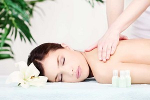 Total Body Spa Pic 3 - Lady enjoying a relaxing massage to ease tension and pain away