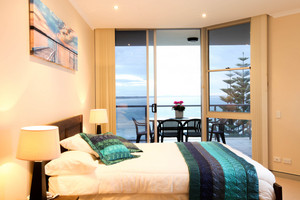 Port Macquarie Accommodation Pic 5 - Master bedroom has spa and perfect ocean views