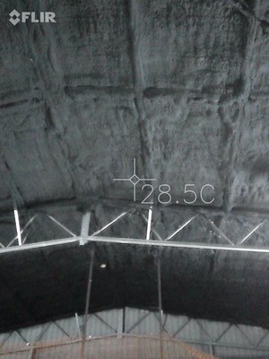 Spray Foam Insulation Pic 5 - UNDERSIDE OF WAREHOUSE ROOF AND PAINTED BLACK