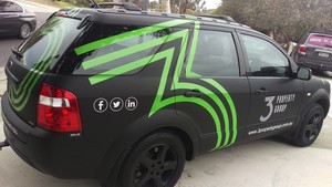 Pixel Monster Pic 4 - Full Matte Black Ford Territory Wrap with Green White Vinyl Graphics for 3 Property Group