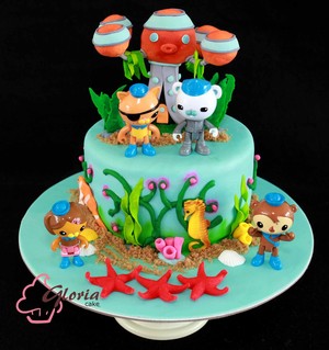 Gloria Cake Pic 5 - Octonauts Birthday Cake Handsculpted Octopod on single tier souffle cake with fresh strawberry buttercream fillings