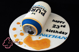 Gloria Cake Pic 3 - Yes it is a cake A surprised birthday cake Shaped as a beer can complete with the spill