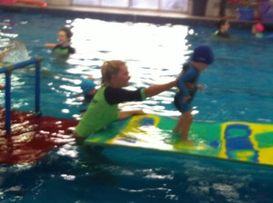 Swimworld Gold Coast Pic 2 - Our babies love singing playing and socialising as they learn safe entries and exits kicking and paddling turns breath control rolling submerging and monkeying