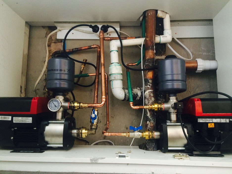 Point Plumbing Pic 1 - Hot and cold variable speed pumps installed in cabinet in Mosman