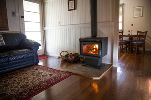 Hillview Cottages Pic 5 - Warm yourself by the fireplace