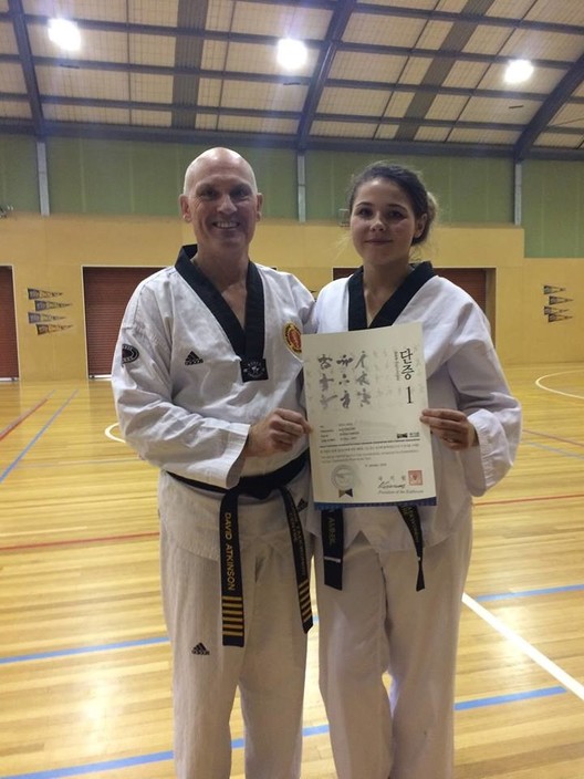 Bendigo Taekwondo Pic 1 - Jemma receiving her 1st Dan Kukkiwon certificate Apr 2016