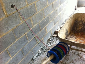 J Spark Electrical Pic 2 - Running cables through conduit in walls for GPOs