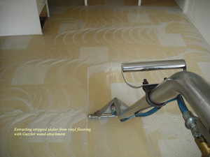 Deluxe Carpet Cleaning Mackay Pic 3 - Stripping off old sealer preparing to apply new vinyl sealer