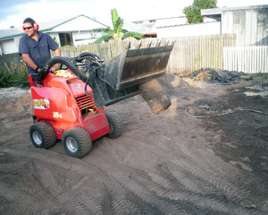 Brisbane Dingo Earthworks Pic 3 - Removing heavy concrete posts