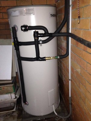 Smart State Plumbing Services Pic 3 - Replaced an old and burst hot water system today with a Thermann Solar Ready electric storage hot water system 7 year tank warranty