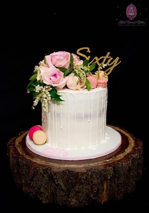 Katie Young's Cakes Pic 3 - Buttercream cake with flowers and macarons