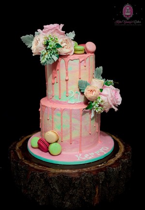 Katie Young's Cakes Pic 4 - 2 tier marbled buttercream cake with fresh flowers and macarons