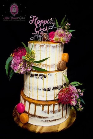 Katie Young's Cakes Pic 5 - Australian native fresh flowers on a semi naked 3 tier wedding cake