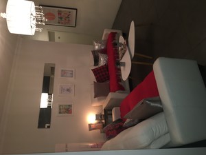 The Sanctuary Day Spa Pic 3 - Relax in our red lounge