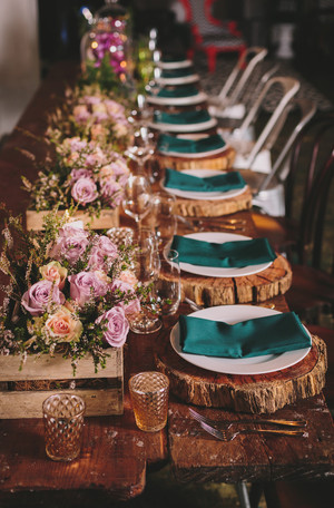 Divine Events Pic 3 - Rustic tablescape featuring flowers and wooden crates