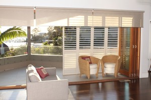 Bayside Shutters and Blinds Pic 3 - Motorised blinds overlooking Pittwater